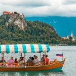 Pletna ride and Bled castle in the background